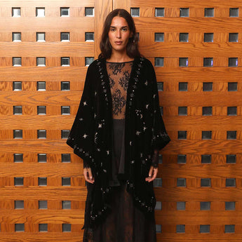 A HUNDRED RISING SUNS VELVET BLACK PONCHO