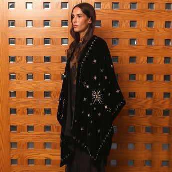 A HUNDRED RISING SUNS VELVET BLACK PONCHO