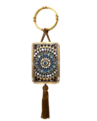 Decorative keychain with geometric pattern and tassel on a white background