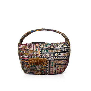 Multicolored beadwork handbag with intricate patterns on a white background