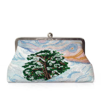 A kiss-lock clutch purse featuring an embroidered design of a snow-covered pine tree in a swirling, Van Gogh-inspired sky with blue, pink, and orange tones.
