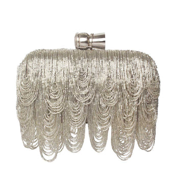 Silver beaded clutch with a champagne cork bag on a white background