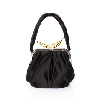A black handbag with a metallic clasp and a textured surface, viewed from the front.