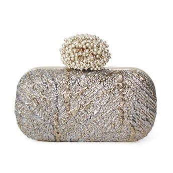 Elegant clutch bag with a decorative dhalia clasp on a white background