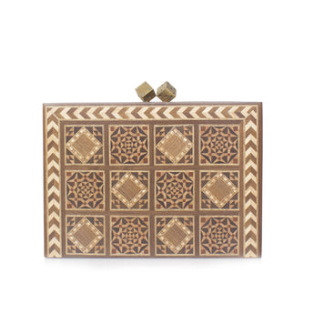 Dama Bag – Handcrafted clutch by Sarah's Bag featuring intricate geometric patterns and inlaid design