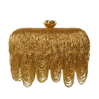 Gold beaded clutch on a white background