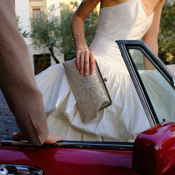 RISING SUN SILVER CLASSIC CLUTCH