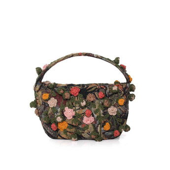 Earth Roses Le Petit, a small top-handle bag covered in hand-crocheted roses in pink, coral and ochre
