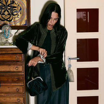 Model wearing the Emerald Velvet Casa Jacket, emerald green velvet jacket