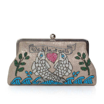 Handbag with embroidered design of two fishes holding a heart, on a white background