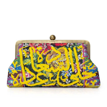 Colorful handbag with beaded yellow arabic calligraphy with a chain on a white background
