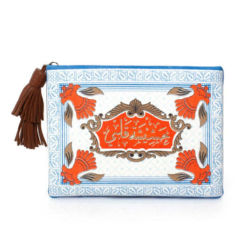 Pouch with decorative design and tassel on a white background