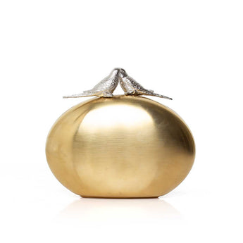 Gold oval clutch with two silver bird on top on a white background