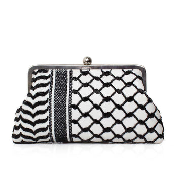 Black and white patterned clutch bag on a white background