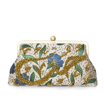A clutch handbag with a floral pattern and gold-colored beads forming a text hobb that means love.