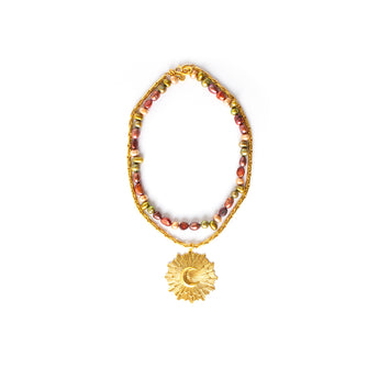 A gold-colored necklace with a variety of sunrise pearls and a single sun rise design pendant with moon.