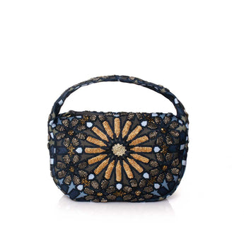 Decorative Moroccan handbag with gold and blue patterns on a white background