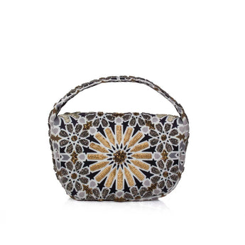 Handbag with a decorative Moroccan pattern on a white background