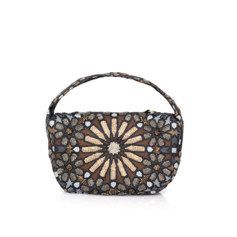 Moroccan Metallic Le Petit bag with gold sunburst beadwork, dark geometric patterns and a rounded top handle.