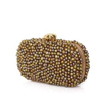 A beaded clutch bag with iridescent pearl-like beads in gold, bronze, and brown tones, featuring a gold-tone clasp and a light brown leather trim, shown on a white background.