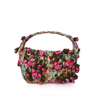 Floral patterned with crocheted pink roses handbag on a white background