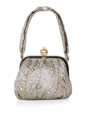 Gold metallic handbag with a pomegranate clasp on a white background