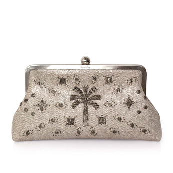 A silver glitter clutch bag with a metal kiss-lock frame and a central palm tree motif embellished with dark rhinestones, set against a plain white background.
