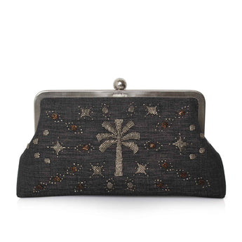 A black beaded clutch purse featuring a central silver beaded palm tree and scattered star-like motifs, framed by a silver-tone metal kiss-lock closure.