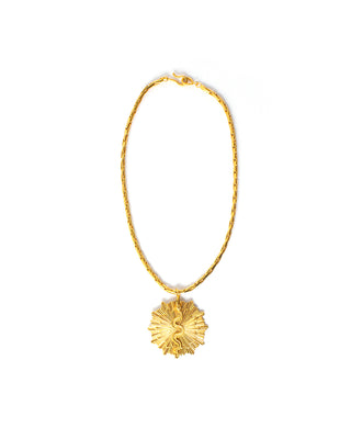 A gold-colored necklace with a floral-shaped pendant.