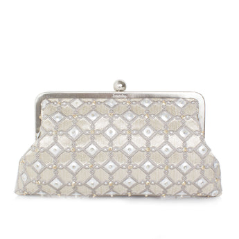 A silver clutch bag with intricate hand-beading, featuring a metal clasp closure.