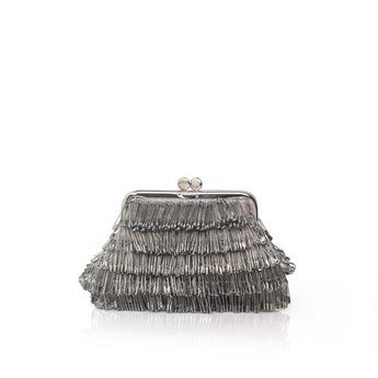 Silver clutch bag with pins on a white background