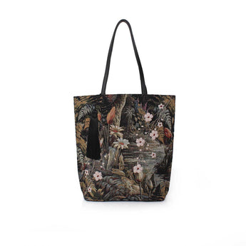 The Secret Garden City Tote, a floral tapestry tote bag with black handles and a black tassel